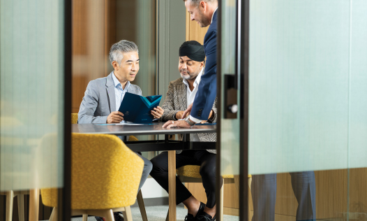 banker and client in a meeting room 